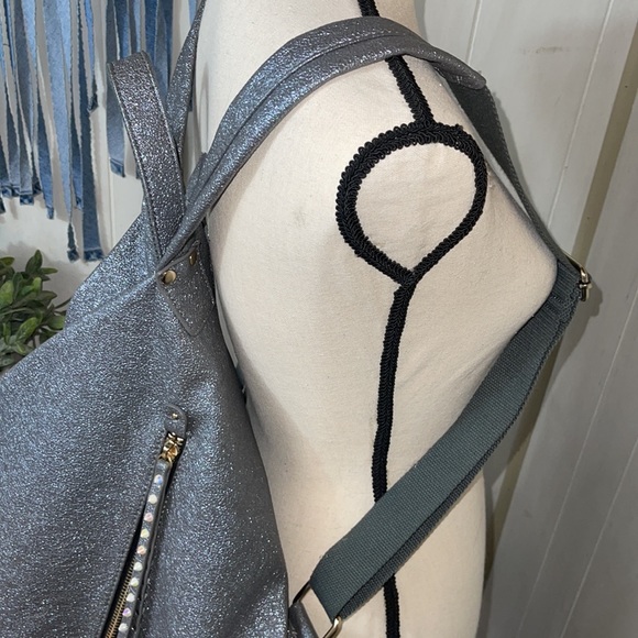 Metallic silver and multi color stud fold over backpack. Vegan leather. - Picture 5 of 5